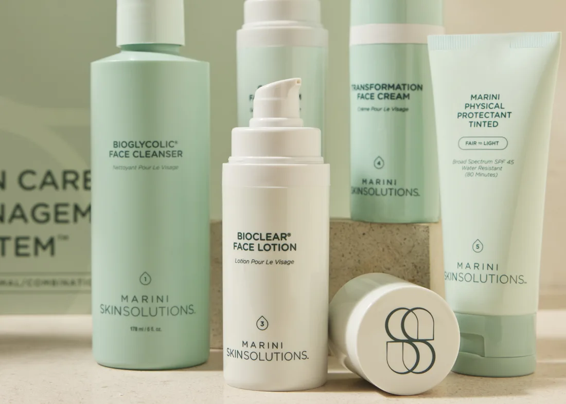 Marini Skin Care Management System displayed in a softly lit bathroom